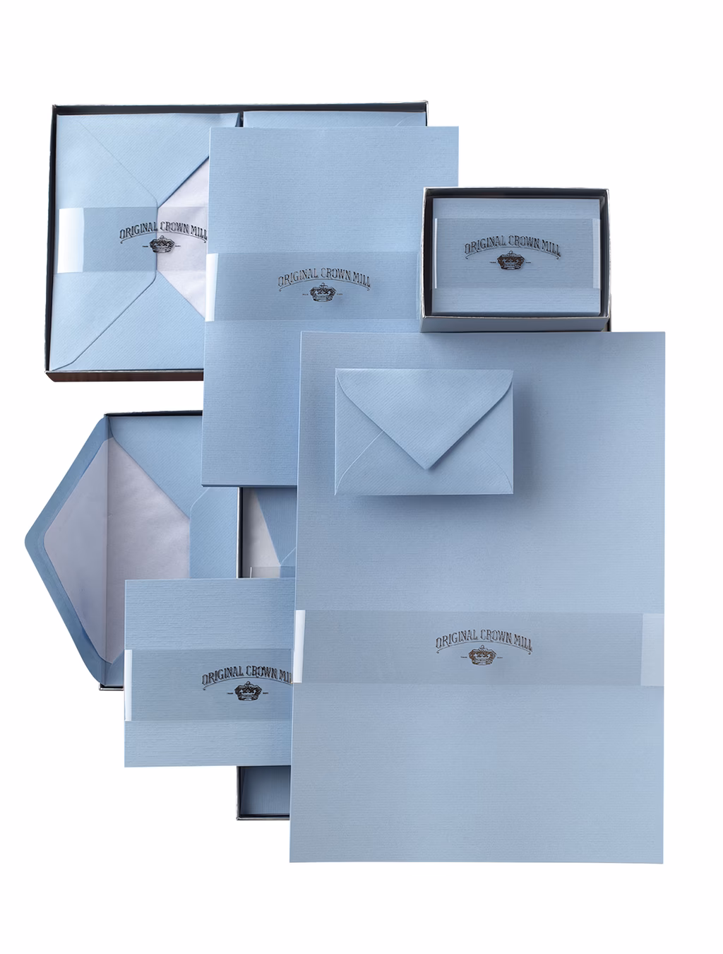 Elegant blaue Briefpapier-Set von Original Crown Mill mit Umschlägen, Boxen und gestempeltem Logo.